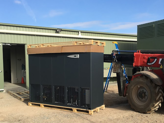 Climaveneta i-BRE 190b indoor unit being loaded for installation